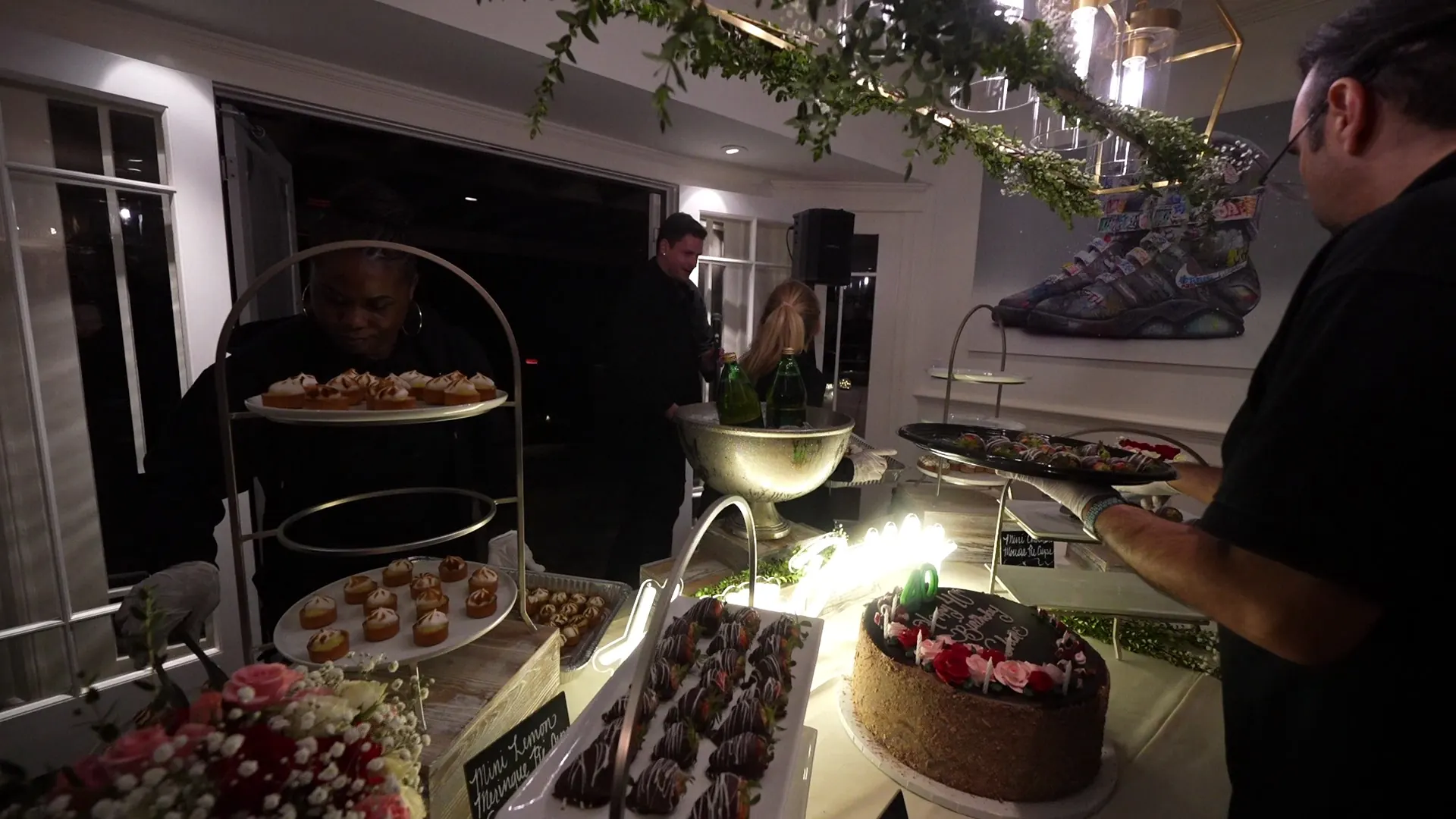 Grazing table of charcuterie, fruit, and small bites for guests to browse