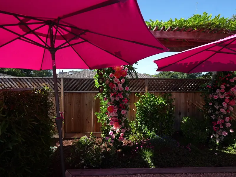 Casual buffet table with hot entrées and salads for an outdoor gathering