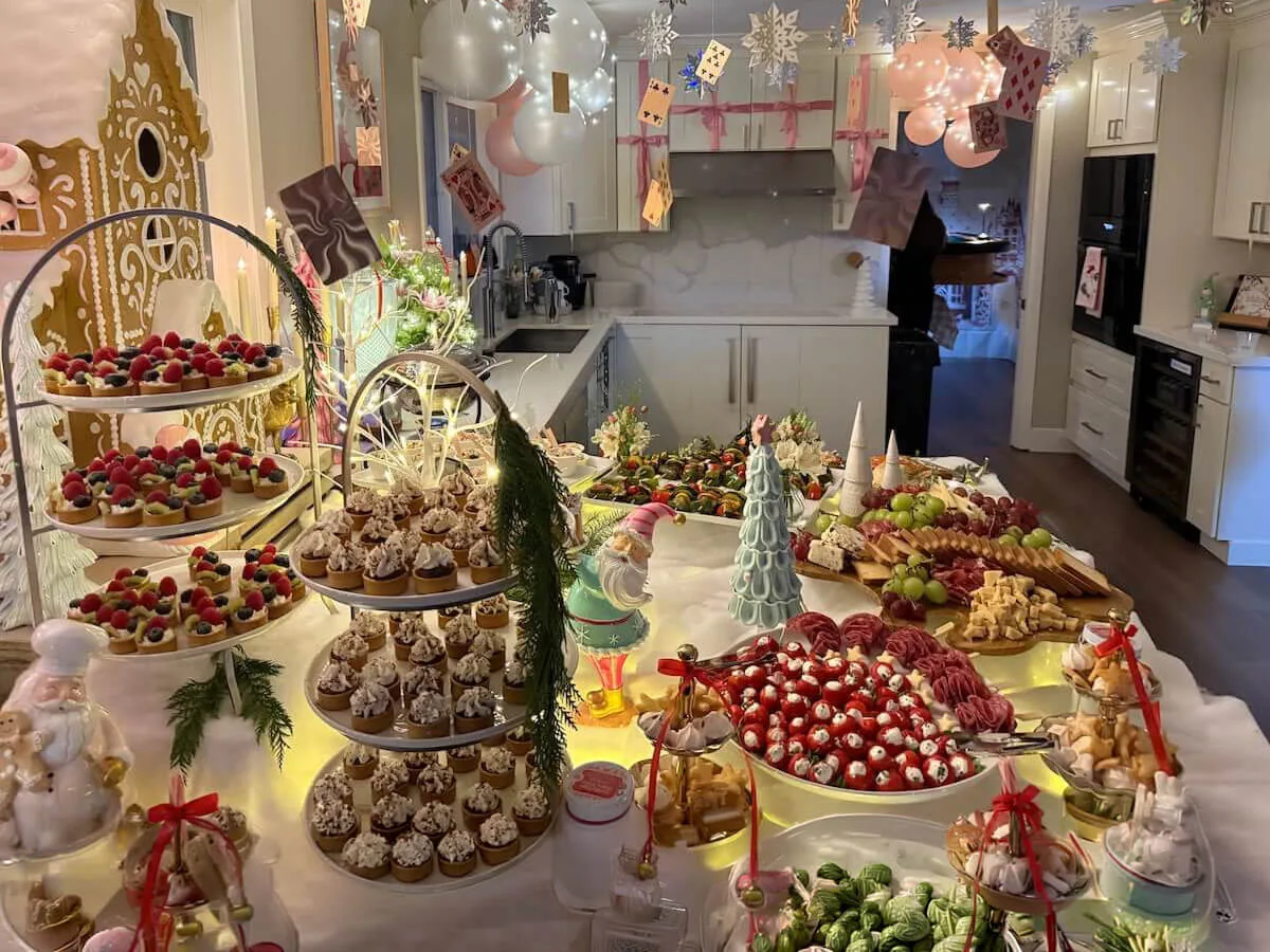 Holiday party spread with carved roast, seasonal vegetables and warm sides at a Concord workplace celebration by Winslow's Catering Concord