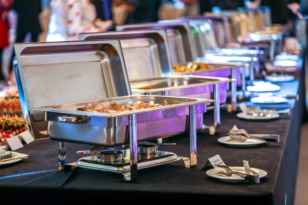Food warmers setup in a buffet table for orinda catering